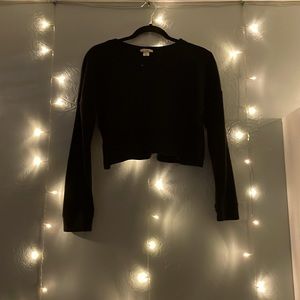 A black long sleeved crop top